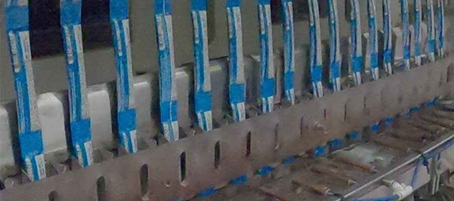 Stick Packs being Filled on Conveyor Belt